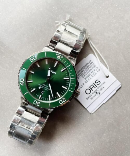 ORIS AQUIS green face CERAMIC bezel SW200 SWISS movement - Image 5
